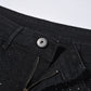 Schmal geschnittene schwarze Jeans mit Strassverzierung