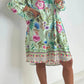 Lockeres Kleid mit V-Ausschnitt und halber Knopfleiste mit Blumenmuster