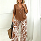 Set aus Damenbluse mit V-Ausschnitt und bedruckter Hose mit weitem Bein