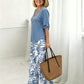 Set aus Damenbluse mit V-Ausschnitt und bedruckter Hose mit weitem Bein