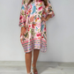 Lockeres Kleid mit V-Ausschnitt und halber Knopfleiste mit Blumenmuster