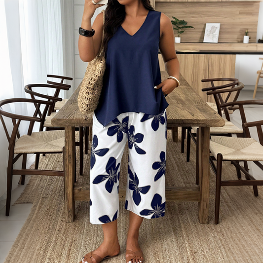 👚🌸 NUR FÜR KURZE ZEIT: 50% RABATT! Set aus asymmetrischem Damenoberteil & Caprihose mit Blumenmuster – Vielseitig, farbenfroh, bequem 🌺